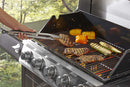 Stainless Steel 2-Piece BBQ Tool Set with Spatula and Locking Tongs. Tongs are shown while grilling.