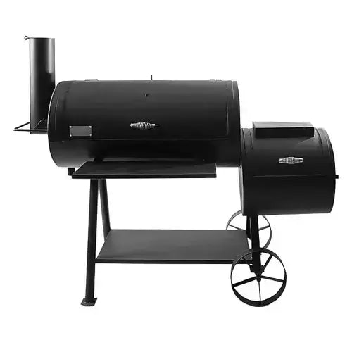 offset smoker with firebox and smoking chamber in backyard setup