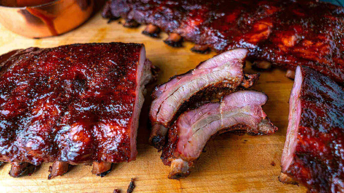 Fall-off-the-bone pork ribs cooked using the 3-2-1 smoking method