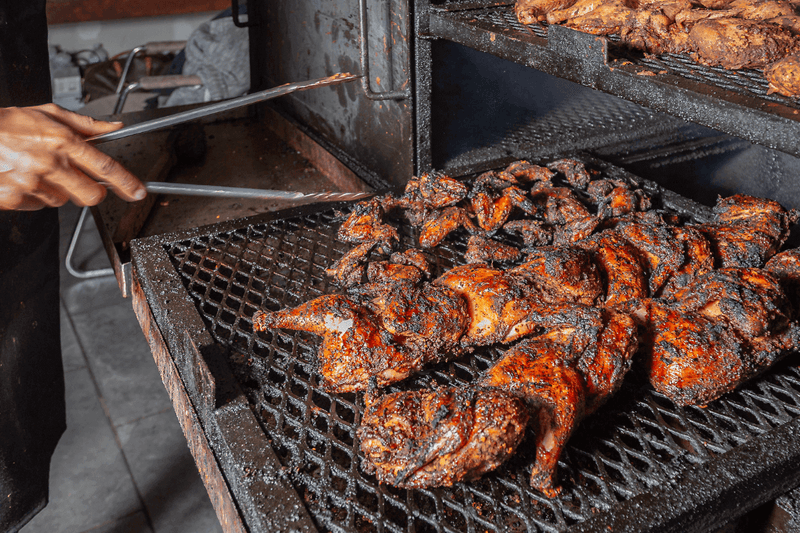Smoker seasoning guide by DDR BBQ Supply showing how to prep offset, gravity-fed, and pellet smokers for clean, flavorful cooks