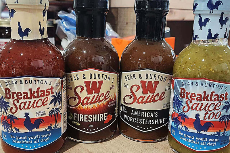 Bear & Burton W Sauce, Fireshire, and Breakfast Sauce bottles with suggested uses for BBQ, jerky, eggs, and Bloody Marys