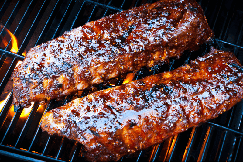 Guide explaining how to tell when pork ribs are done using temperature and texture tests