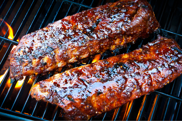 Guide explaining how to tell when pork ribs are done using temperature and texture tests