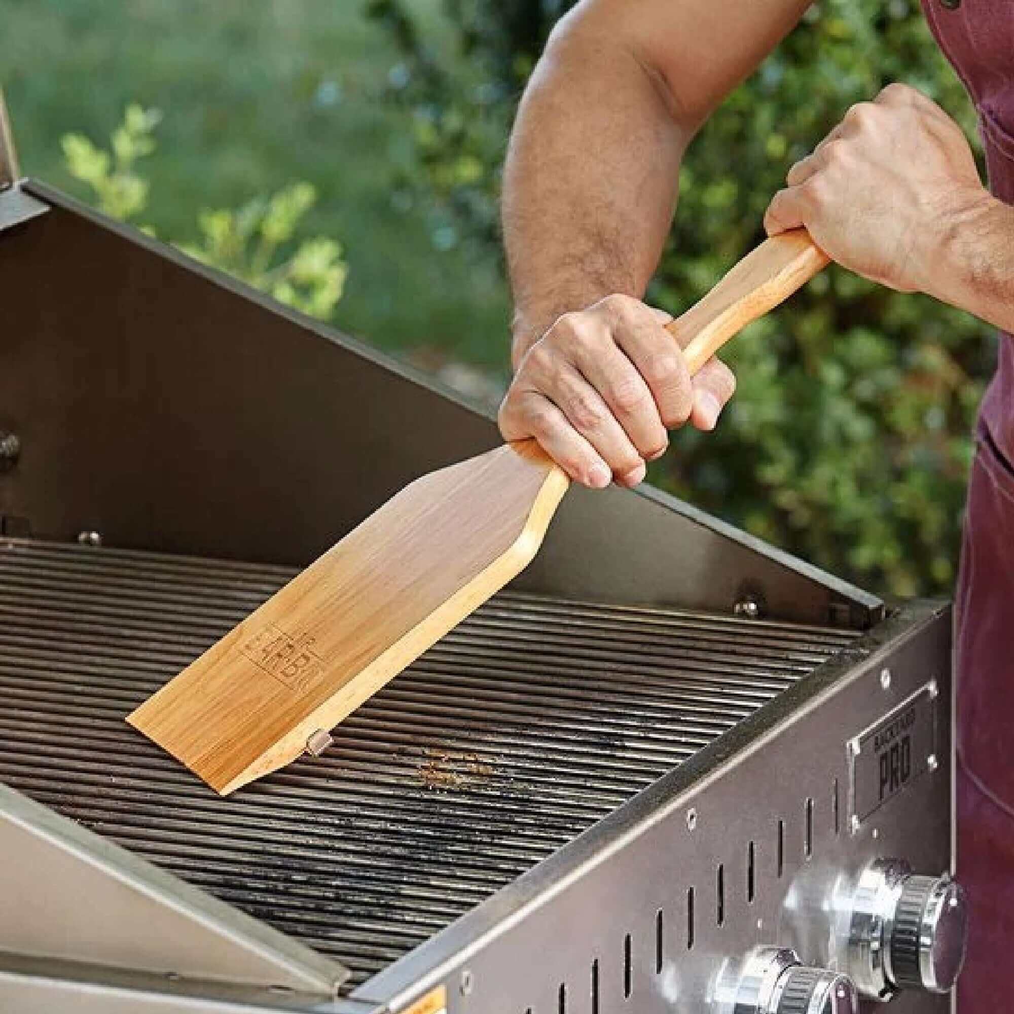BBQ cleaning tools and heat-resistant gloves — essential gear for safely cleaning grills, smokers, and handling hot cooking surfaces.