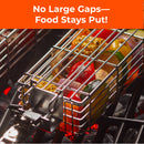 A close-up of the Braize 3-Piece Stainless Steel Kabob Grilling Basket Set with Removable Handle, filled with chopped vegetables over coals, and a banner at the top: No Large Gaps—Food Stays Put!.
