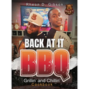 Hardcover cookbook cover for Back At It BBQ Grillin’ and Chillin’, featuring two men in a kitchen preparing Southern-style BBQ recipes.