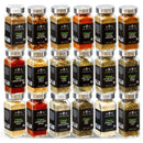Eighteen glass jars with silver lids, each labeled with different USDA Certified Organic spices and herbs such as cumin, red pepper, cinnamon, garlic, thyme, basil, black pepper, bay leaf, and more—The Spice Lab Organic Starter Spice Set is thoughtfully arranged in four rows to elevate your everyday cooking.
