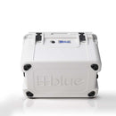White rectangular 60 quart Blue Coolers 60 Quart Roto Molded Cooler Superior Ice Retention Outdoors with black latches and molded text on the front.