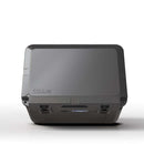 Closed grey Blue Coolers 60 Quart Roto Molded Cooler Superior Ice Retention Outdoors with a rectangular lid.