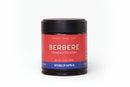 A compact black jar labeled World Spice Berbere features a red and blue label and holds 2.12 oz (60g) of spice from World Spice. This traditional Ethiopian blend delivers notes of picante, umami, and heat—making it perfect for adding bold flavor to tomatoes and stews.