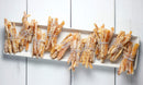 Sanding Con AA Sugar from The Spice Lab glistens atop sugared candied orange peel sticks, which are bundled with string and arranged in rows on a white rectangular platter set on a white wooden surface—a perfect treat for decorative baking or as a vibrant alternative to cupcake sprinkles.