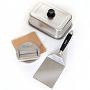 The Braize Smash Burger Press Kit includes a 9" x 12" melting dome, stainless steel spatula with black handle, burger press, and parchment paper—all displayed on a white background.