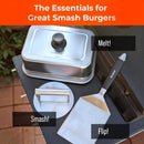 A Braize Smash Burger Press Kit with a 9" x 12" melting dome and stainless steel spatula, each labeled Smash!, Melt!, or Flip!; text: “The Essentials for Great Smash Burgers.”.