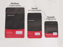 Three spice bags labeled Medium (1 cup), Small (1/2 cup), and Sample (2 tablespoons) are arranged left to right on a white surface. Each bag, from World Spice, is black and red with product descriptions and white labeling spaces—ideal for showcasing World Spice Hazelnut Dukkah, a flavorful Egyptian blend perfect as a savory dip for bread or vegetables.