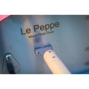 Close-up of the metal surface labeled WPPO Le Peppe Portable Wood-Fired Pizza Oven by WPPO LLC Direct, highlighting a sturdy wooden handle attached to the oven—an ideal detail shot for showcasing your outdoor pizza oven setup.