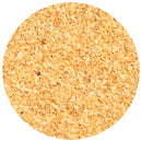 A close-up, top view of a circular pile of The Spice Lab Minced Garlic 1 lb Bulk Foodservice Spice, highlighting the brand’s dried, small and irregular yellowish-tan garlic pieces commonly used as a seasoning, set against a white background.