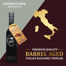 A bottle of Georgetown Olive Oil Co. 18 YEAR AGED Balsamic Vinegar Reduction with a tag, placed next to a gold outline of Italy and text highlighting the premium quality Modena balsamic vinegar from Georgetown Olive Oil Co.
