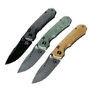 Three Spaceman Knives N1 EDC folding knives with textured Micarta handles in gray, green, and tan by Spaceman Knives are arranged diagonally on a rough gray surface with bark in the upper left corner.