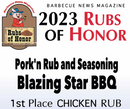 Blazing Star Pork’n Rub and Seasoning by Blazing Star BBQ was awarded 1st Place in the Chicken Rub category at Barbecue News Magazine’s 2023 Rubs of Honor. This award-winning BBQ seasoning is celebrated for its bold flavors, making it ideal as both a pork rub and a top-notch chicken seasoning. The logo features a pig in a hat and apron holding grilling tools.