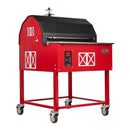 The Smokin Brothers “30” Premier Plus Barn-B-Que Grill by Smokin Brothers is designed to resemble a classic barn, featuring white accents and four caster wheels for easy mobility—perfect for pellet cooking in outdoor kitchens. Shown here on a white background.