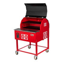 The Smokin Brothers “30” Premier Plus Barn-B-Que Grill by Smokin Brothers is a red, barn-shaped barbeque grill featuring white window designs, an open lid, a front control panel, and four wheels for easy mobility. Designed for outdoor kitchens, it includes both upper and lower cooking racks inside and is perfect for pellet cooking.