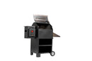 Smokin Brothers Inferno Grill - 20″ by Smokin Brothers, shown in black with an open lid, features a side control panel, convenient lower storage shelves, and wheels for easy mobility—all set against a plain white background. Experience serious searing power and impressive wood-fired performance in this versatile grill designed for effortless transport.