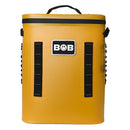 Introducing the Bob - The Cooler Co. 25L "The Bro" Backpack Soft Cooler—a durable, yellow rectangular insulated cooler bag featuring a black top handle, black side straps, and a distinctive “BOB” logo in white and black on the front—designed to keep your refreshments secure and cool wherever you go.