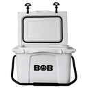 A white Bob The Cooler Co. 25QT "Wingman" hard cooler featuring a black handle and the BOB logo with a lightning bolt on the front; the open lid reveals an additional smaller compartment inside.