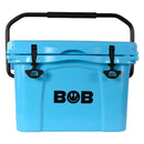 Introducing the Bob - The Cooler Co. 25QT / 23.6L "Wingman" Hard Cooler: a blue, commercial-grade cooler featuring a sturdy black handle, dual black latches, convenient built-in bottle openers, and the signature BOB logo with a lightning bolt and smiley face on the front. Ideal for any adventure, this cooler is perfect for keeping your drinks chilled wherever you go.