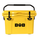 Here’s a rewritten version using the provided product data: The Bob - The Cooler Co. 25QT / 23.6L "Wingman" Hard Cooler is a vibrant yellow cooler featuring sturdy black handles and latches, along with the iconic BOB name and lightning bolt logo on the front. With excellent insulation, this cooler keeps your items chilled for hours—ideal for any adventure.