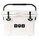 Introducing the Bob The Cooler Co. 25QT / 23.6L "Wingman" Hard Cooler—a white, hard-sided cooler from Bob - The Cooler Co., featuring a sturdy black handle and latches. The front proudly displays “BOB” in bold black lettering, with a smiley face cleverly replacing the ‘O’. Expertly insulated to keep your items chilled for longer, this cooler is perfect for any adventure.