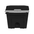 The Taiga Coolers 27 Quart Black Cooler, featuring black and gray insulation and a front drain plug, is displayed against a plain white background.