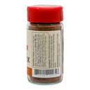 A clear spice jar with a red lid from Powerful Pepper Company is shown. The label on the jar of Powerful Pepper Taco Mix lists nutrition facts and ingredients such as ancho chili powder, garlic, onion, chipotle, paprika, coriander, and salt. This smoky taco seasoning adds bold Southwestern flavor to your meals. A barcode appears at the bottom of the label.