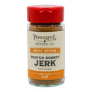 A 3 oz (85g) jar of Powerful Pepper Company Scotch Bonnet Jerk Seasoning with a red lid and a white-and-orange label; heat level 5/10. This gourmet Caribbean jerk rub is perfect for adding bold flavor to your dishes.