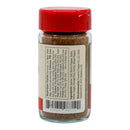 A clear spice jar with a red lid features a label displaying nutrition facts, an ingredients list, and manufacturer details from the Powerful Pepper Company. The small text covers most of the visible side of the jar. Perfect for storing your favorite Powerful Pepper Ghost Chili BBQ Rub Seasoning Mix or other spicy barbecue rub blends.