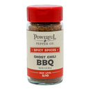 A clear spice jar with a red lid labeled Powerful Pepper Company Ghost Chili BBQ Rub Seasoning Mix. Packed with bold ghost chili powder, this BBQ rub delivers a medium heat level of 5 out of 10 and contains 3 oz (85g) of flavorful, spicy barbecue seasoning.