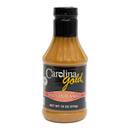 A plastic bottle of Gourmet Carolina Gold Spicy Hot Carolina Gold BBQ Sauce featuring a black label.