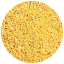 A close-up view of a circular pile of yellow cornmeal with fine and coarse grains, lightly dusted with The Spice Lab Country Style Honey Mustard Seasoning by The Spice Lab, set against a white background.