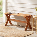 Two DirectDeals Outdoor Wood Bench Set of 2 - 36 Inch Backless Patio Seating pieces sit on a stone patio near a woven rug and round table with flowers, against a white paneled wall.