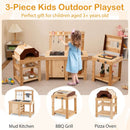 A young girl in a blue dress plays with the DirectDeals 3-Piece Outdoor Kitchen Set Mud Kitchen with Separate BBQ Grill and Pizza Oven-Natural, while toys and stuffed animals decorate the cozy room in the background.