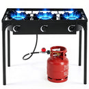 The DirectDeals 3 Burner Propane Stove 240000 BTU Outdoor Camping Grill has black construction, blue flames, control knobs, a hose-linked red propane tank below, and stands on four legs.