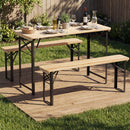 The 3-Piece Folding Picnic Table with Benches Fir Wood Portable Bear Camping SET by DirectDeals is set for dining on a deck in a grassy yard, complete with plates, glasses, bottles, and a basket for an inviting outdoor meal.