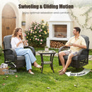 A woman and a man enjoy tea in a sunny garden, relaxing in the DirectDeals 3-Piece Patio Swivel Rocker Set with Glass Side Table. Their cushioned chairs offer smooth swivel motion, with flowers and a fireplace close by.