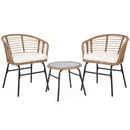 The DirectDeals 3-Piece Patio Conversation Set with Cushions features two wicker chairs with white cushions and black metal legs, plus a round glass-top table with a matching wicker edge.