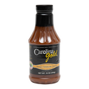A bottle of Gourmet Carolina Gold Sweet Vinegar Carolina Gold BBQSauce with a black label.