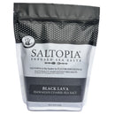 A 3-pound resealable bag of Saltopia Black Lava Salt by SALTOPIA Infused Sea Salts, featuring Hawaiian black lava sea salt with activated charcoal. The mostly black and white package includes text and a hand stamp graphic in the top left corner.