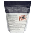 A resealable bag labeled SALTOPIA Infused Sea Salts contains Saltopia Mediterranean Flake Sea Salt 3lbs. The upright bag displays product details and an image of coarse sea salt with a black scoop on the right side.