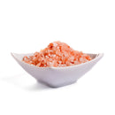 A white dish filled with The Spice Lab Himalayan Pink Salt Coarse Grain, perfect for use in a grinder, isolated on a white background.