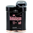 A black container of The Spice Lab Himalayan Pink Salt Coarse Grain from The Spice Lab, featuring a built-in salt grinder and refill, filled with coarse salt crystals.