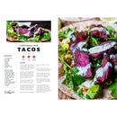 Recipe page for grilled hanger steak tacos, ideal for grilling enthusiasts and inspired by the WPPO Badass Backyard Cooking Cookbook – 140 of my Favorite Outdoor Cooking Recipes from WPPO LLC Direct. A close-up showcases sliced steak on tortillas with greens and sauce. The left side highlights ingredients and method from the cookbook, while the right features a detailed image of the finished taco.
